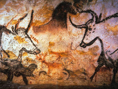 Cave painting of bison and other animals.