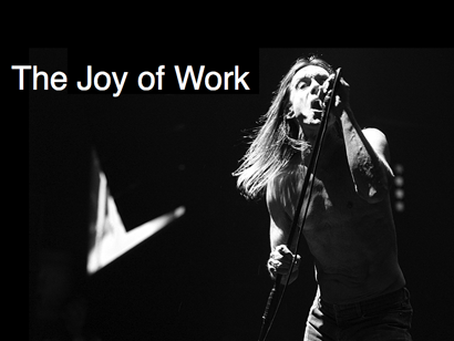 Stunning photo of Iggy Pop on stage with the words The Joy of Work.