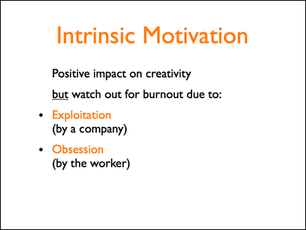 Slide with text about intrinsic motivation in a boring font.